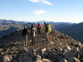 The construction team waits at the summit of the new lift